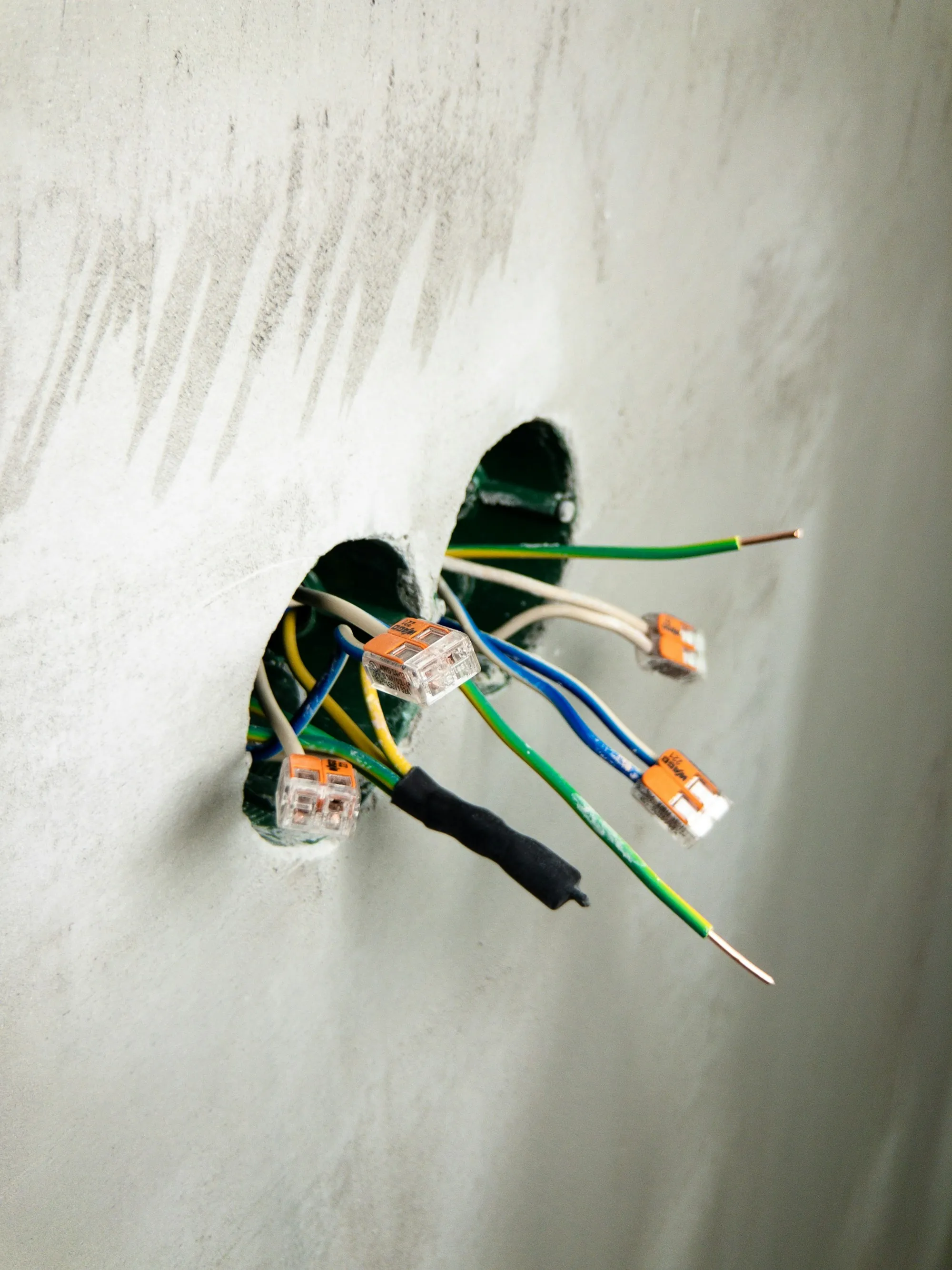 New cable ends ready at a wall opening